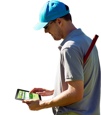 player with mobile scoring tablet on the golf course